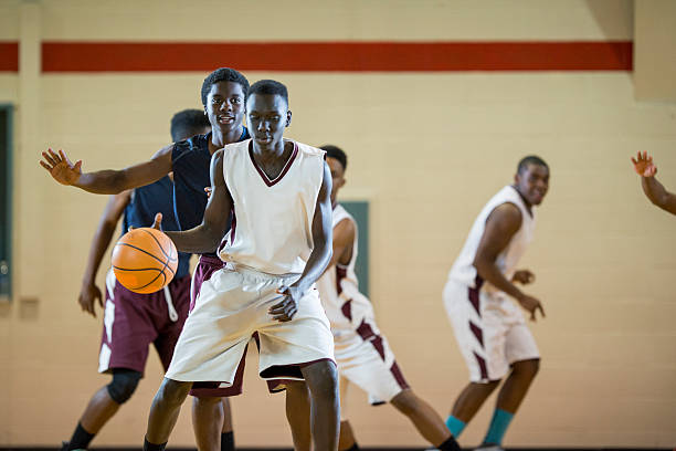 istock College Students Playing a Basketball Game 529416124
