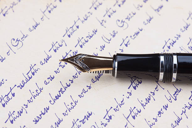 istock old fountain pen and old manuscript 529417251