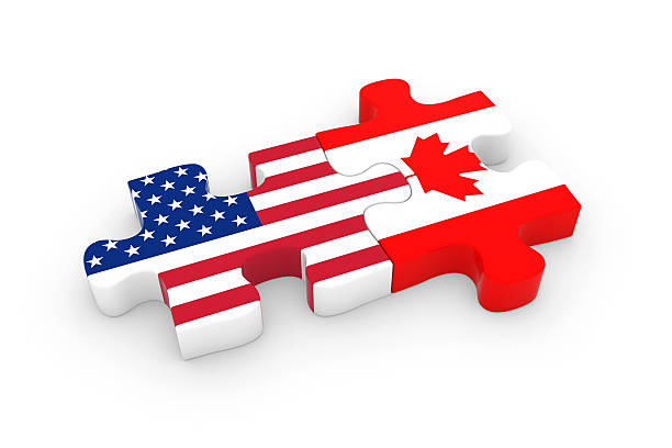 usa und kanada puzzleteile-amerikanische und kanadische fahnen - canada american flag canadian culture usa stock-fotos und bilder
