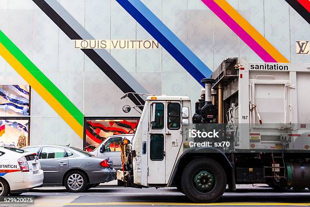 Sanitation Truck Stuck In Front Of Louis Vuitton Store Nyc Stock Photo - Download Image Now