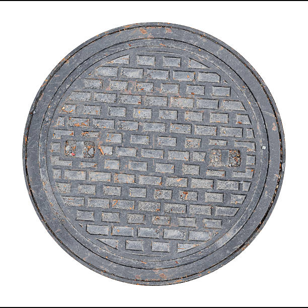 Rusty, grunge manhole cover isolated