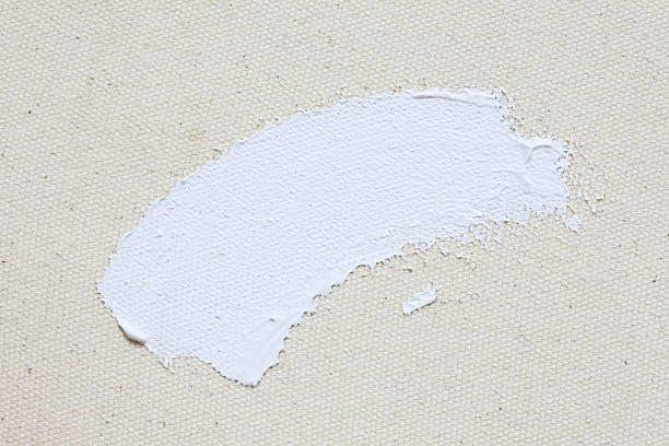 istock white brush strokes paint on canvas background 529421670