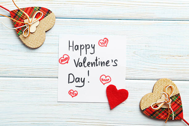 istock Red hearts on a blue wooden table 529422098