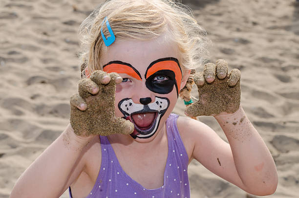 istock girl with face painting 529422233
