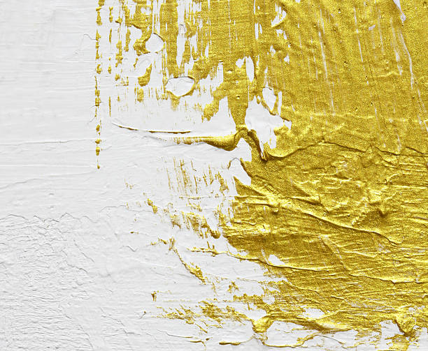 istock gold textured abstract painting on white background 529422542