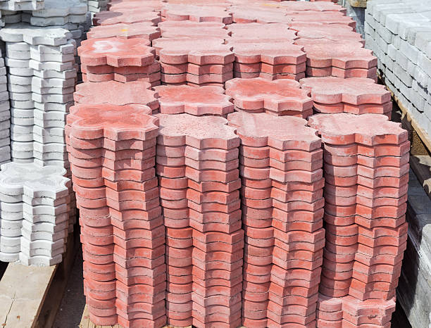 istock Red concrete pavement tiles stacked on a pallet 529422852