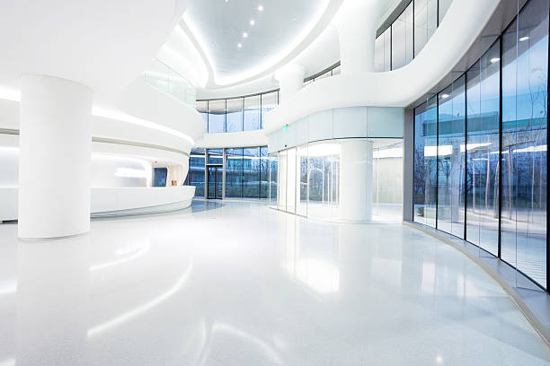 istock futuristic modern office building interior in urban city 529423639