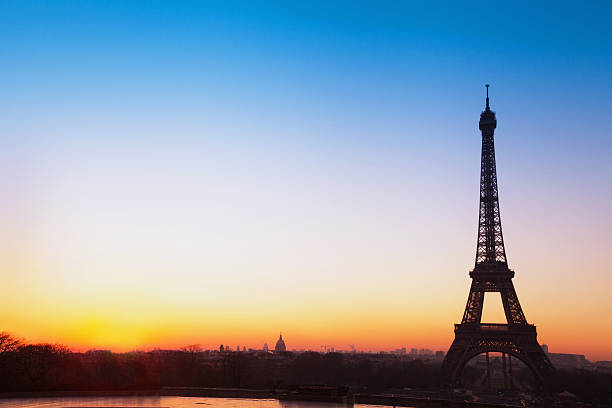 istock Paris background, silhouette of Eiffel tower at sunrise 529424661