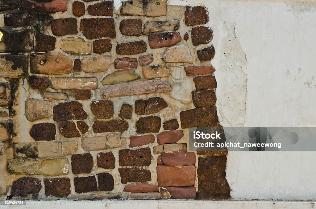 Ancient stone wall. Ancient stone wall in Asia. Abstract Stock Photo