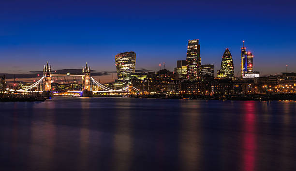 London Cityscape After Sunset Modern London cityscape after sunset on river Thames 2016 stock pictures, royalty-free photos & images