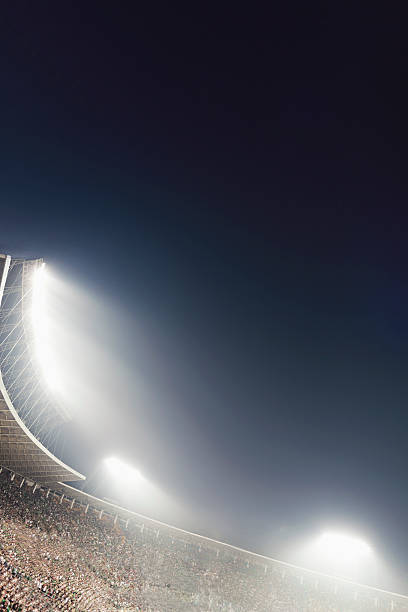 istock View of stadium lights at night 529428198