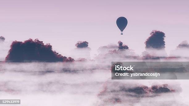 Aerial Of Hot Air Balloon Flying Over Autumn Mountain Landscape Stock Photo - Download Image Now