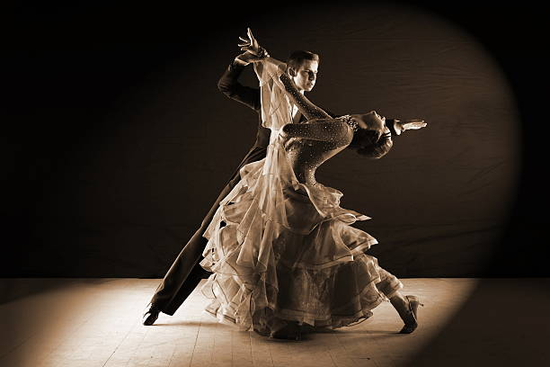 istock dancers in ballroom isolated on black background 529434323