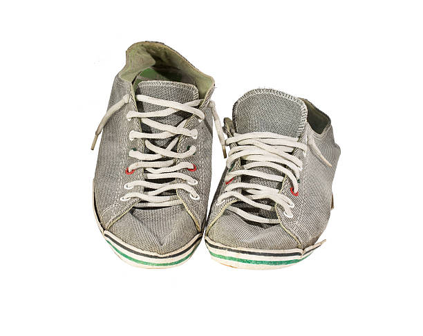 istock Old sneakers,Isolated on white background 529435279