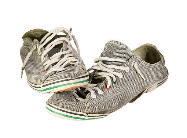 istock Old sneakers,Isolated on white background 529435281