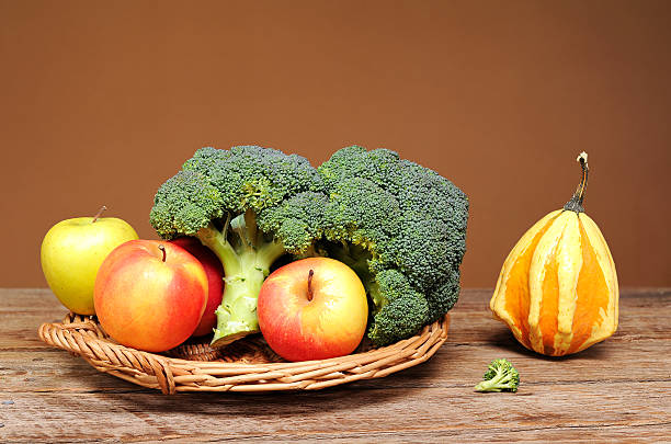 istock Broccoli, apples and decorative pumpkins 529439039