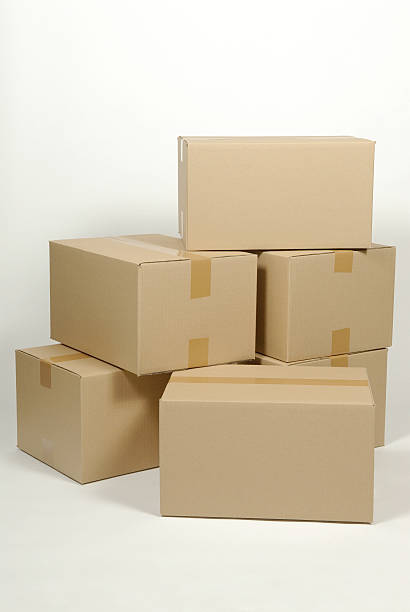 istock pile of cardboard box on white background 529439541