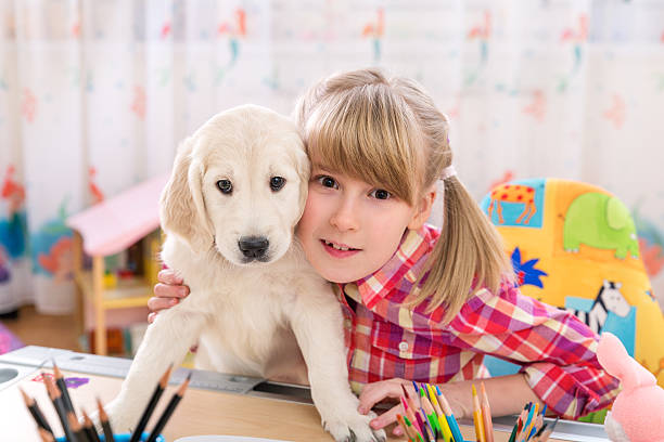 istock Girl and puppy friends 529458155