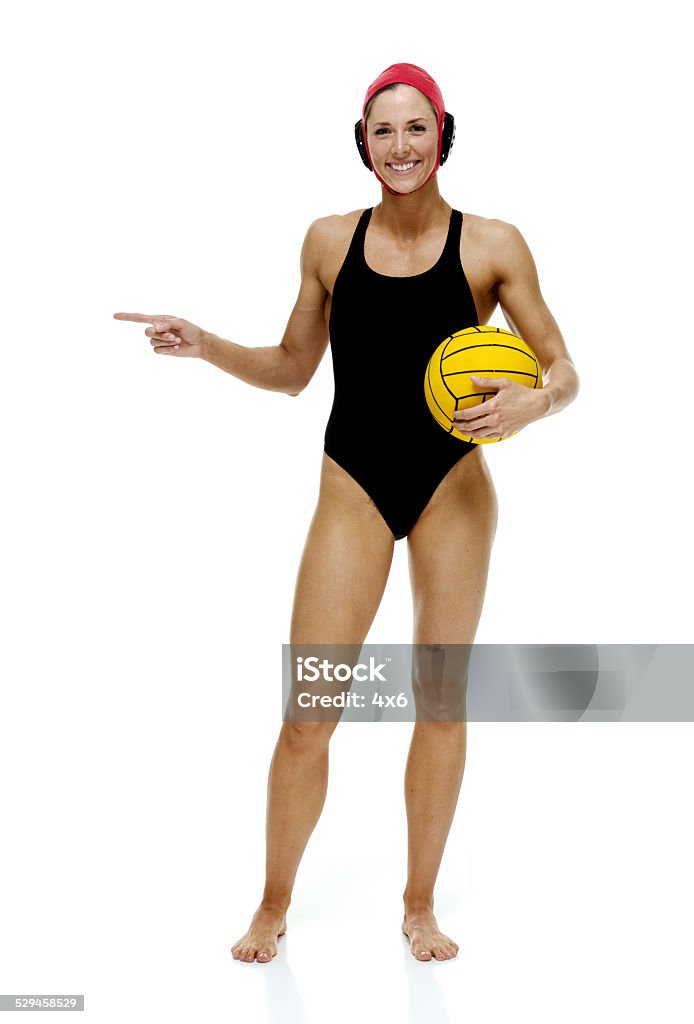 Cheerful swimmer holding waterpolo  ball Cheerful swimmer holding waterpolo  ballhttp://www.twodozendesign.info/i/1.png 20-29 Years Stock Photo