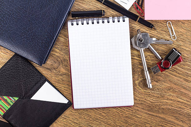 istock Opened notebook on blank page on wooden desktop background 529458615