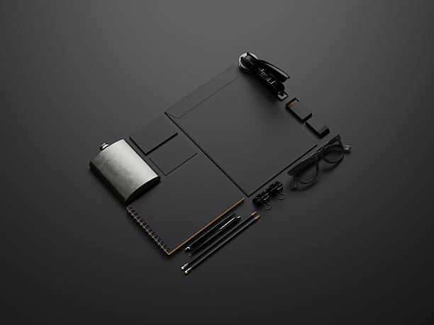 istock Set of black branding elements on black paper 529459105