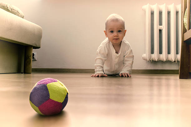 istock baby on the floor 529462181