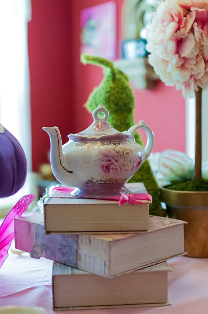 istock Teapot on stack of books at a child's tea party 529462341