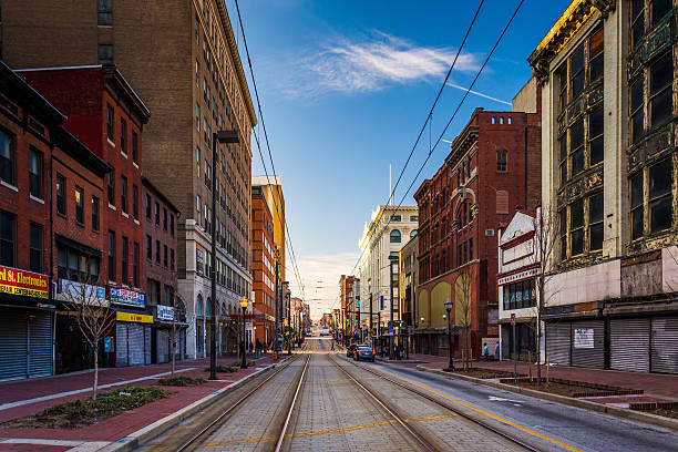 istock Train tracks along Paca Street in Baltimore, Maryland. 529462697