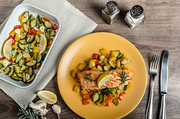 istock Salmon baked with thyme and Mediterranean vegetables 529477399