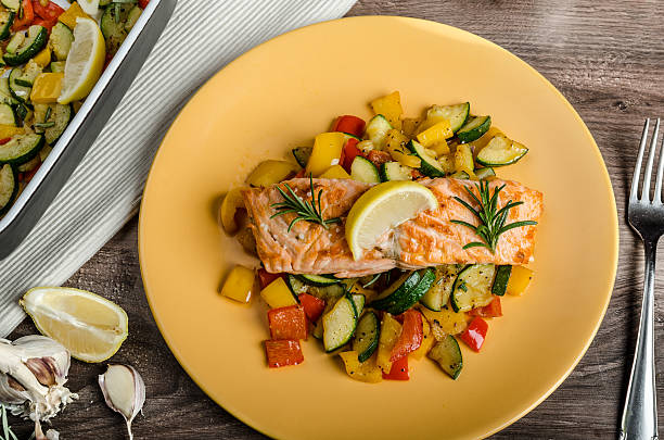 istock Salmon baked with thyme and Mediterranean vegetables 529477405