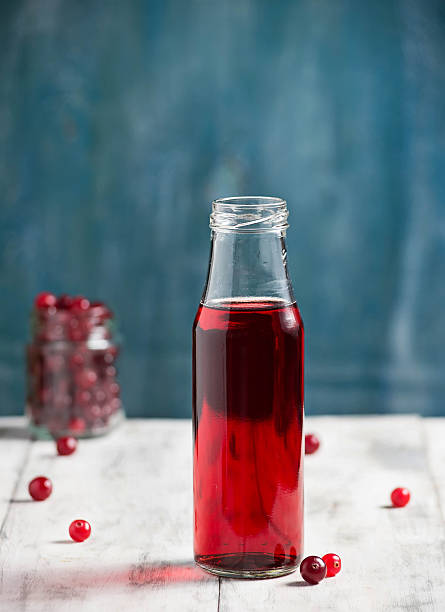 istock Fresh cranberry fruit drink in bottle 529479665