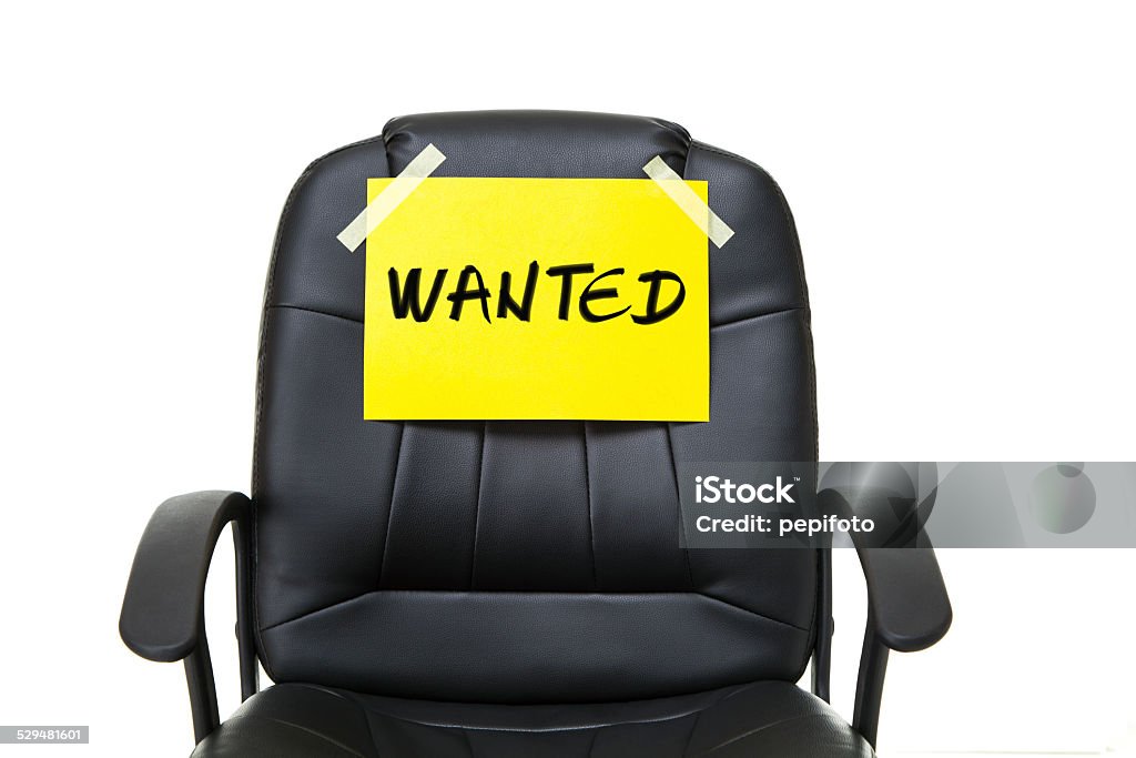wanted poster black leather office chair with yellow paper isolated on white background Help Wanted Sign Stock Photo
