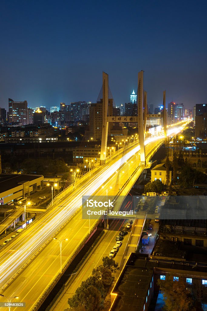 traffic through city and bridge,china traffic through city,night scene of hangzhou Activity Stock Photo