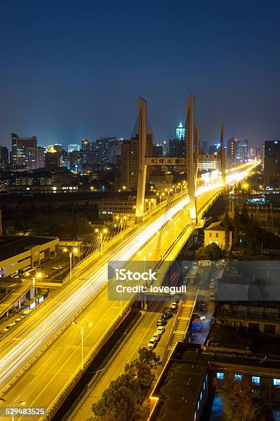 Traffic Through City And Bridge China Stock Photo - Download Image Now - Activity, Architecture, Beauty