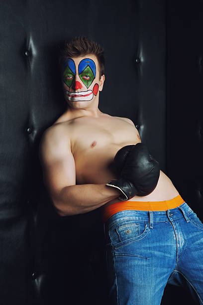 istock Young man in clown makeup 529484189