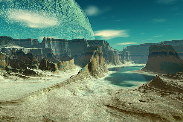 istock 3D rendered fantasy alien planet. Rocks and lake 529493775