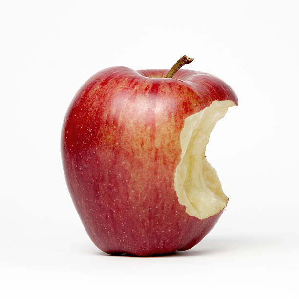 red apple with bite red apple with bite chewing photos stock pictures, royalty-free photos & images