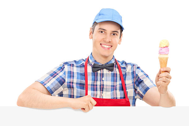 istock Young cheerful man holding an ice cream 529497939