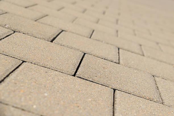 kształtki chodnikowe, kamienie tło - driveway brick paving stone interlocked zdjęcia i obrazy z banku zdjęć