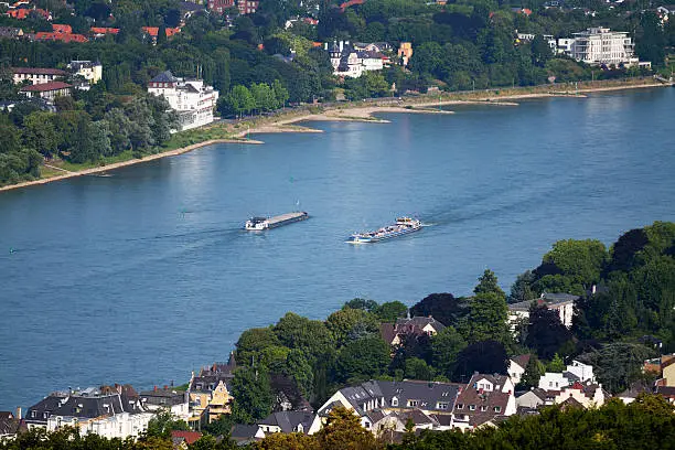 Aerial view of freight ships on Rhine seen from Drachenfels above Königswinter