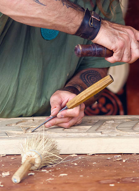 istock Craftsman carving a souvenir from wood 529499911