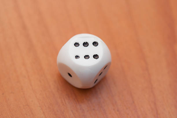 istock single dice displaying six on a vintage wood plank 529500349