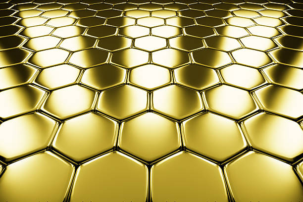 istock Gold metal surface of golden hexagons perspective view 529516147