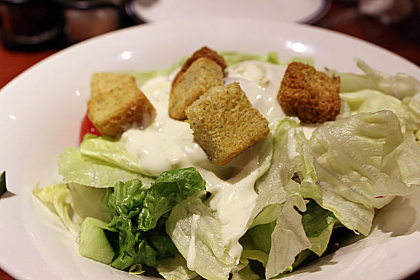 istock Tossed Salad with Dressing and Croutons 529516365