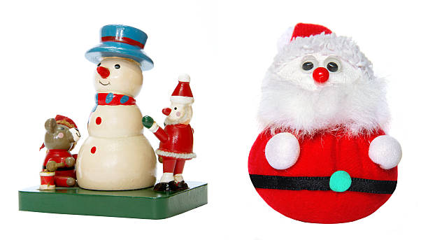 istock Santa Claus and snow man doll 529516975
