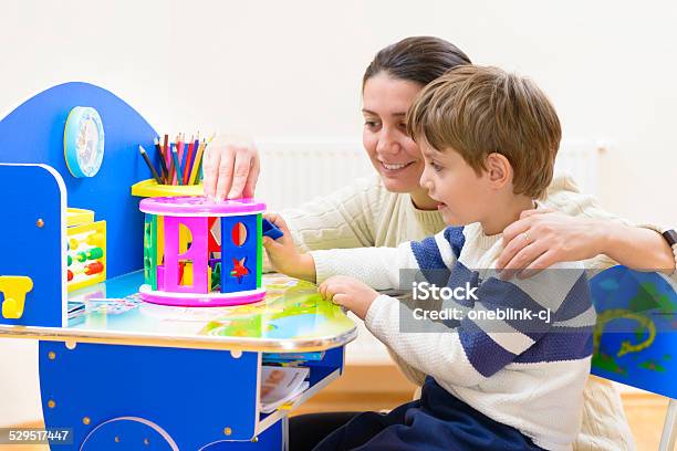 Mother Playing With Her Child Stock Photo - Download Image Now - Assistance, Boys, Preschool Student