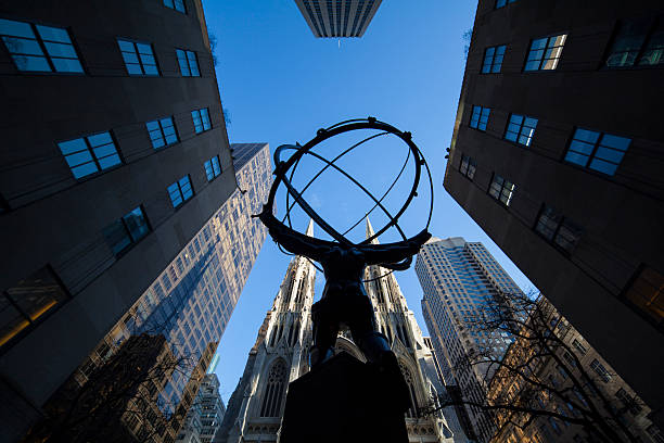 New York, Manhattan, USA - February 15, 2023: Atlas statue by artist Lee Lawrie, made in 1936 in downtown Manhattan on a beautiful winter day