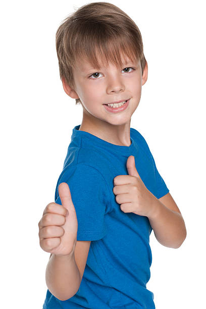 istock Little boy with his thumbs up 529519895