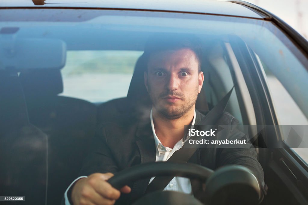 shocked driver shocked driver in the car Driving Stock Photo