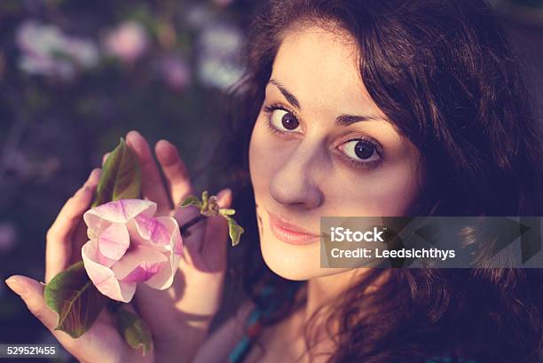 Woman With Magnolia Stock Photo - Download Image Now - Adult, Beautiful People, Beautiful Woman